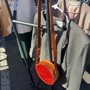 Boutique leather purse with velvet side